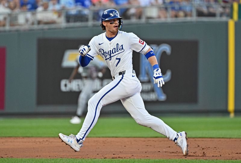 Jun 25, 2024; Kansas City, Missouri, USA; Kansas City Royals shortstop Bobby Witt Jr. (7) rounds second base after hitting a double in the third inning against the Miami Marlins at Kauffman Stadium. Mandatory Credit: Peter Aiken-USA TODAY Sports