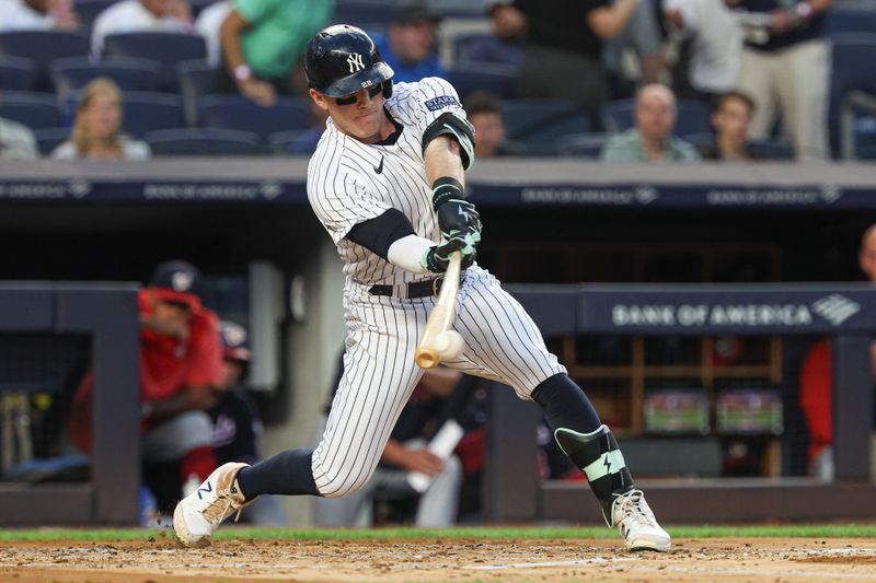 Aug 23, 2023; Bronx, New York, USA; New York Yankees center fielder Harrison Bader (22) singles during the second inning against the Washington Nationals at Yankee Stadium. Mandatory Credit: Vincent Carchietta-USA TODAY Sports