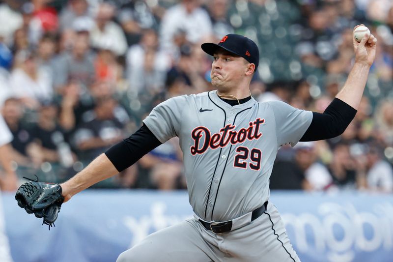 Aug 24, 2024; Chicago, Illinois, USA; Detroit Tigers starting pitcher Tarik Skubal (29) delivers a pitch against the Chicago White Sox during the first inning at Guaranteed Rate Field. Mandatory Credit: Kamil Krzaczynski-USA TODAY Sports