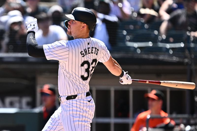 May 25, 2024; Chicago, Illinois, USA;  Chicago White Sox infielder Gavin Sheets (32) hits a three-run triple in the fifth inning against the Baltimore Orioles at Guaranteed Rate Field. Mandatory Credit: Jamie Sabau-USA TODAY Sports