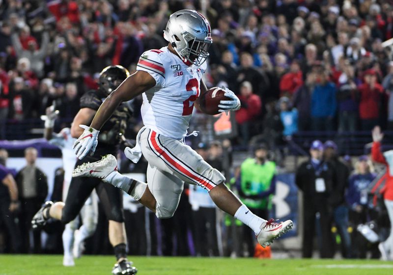 Oct 18, 2019; Evanston, IL, USA; Ohio State Buckeyes running back J.K. Dobbins (2) runs for a touchdown against the Northwestern Wildcats during the first half at Ryan Field. Mandatory Credit: David Banks-USA TODAY Sports