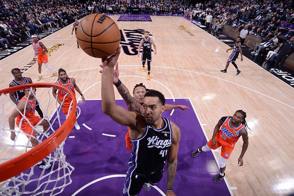 SACRAMENTO, CA - DECEMBER 14: Trey Lyles #41 of the Sacramento Kings dunks the ball during the game against the Oklahoma City Thunder on December 14, 2023 at Golden 1 Center in Sacramento, California. NOTE TO USER: User expressly acknowledges and agrees that, by downloading and or using this Photograph, user is consenting to the terms and conditions of the Getty Images License Agreement. Mandatory Copyright Notice: Copyright 2023 NBAE (Photo by Rocky Widner/NBAE via Getty Images)