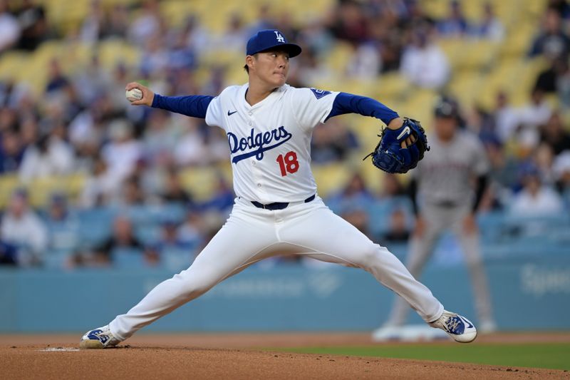 May 20, 2024; Los Angeles, California, USA;  Los Angeles Dodgers starting pitcher Yoshinobu Yamamoto (18) delivers to the plate in the first inning against the Arizona Diamondbacks at Dodger Stadium. Mandatory Credit: Jayne Kamin-Oncea-USA TODAY Sports