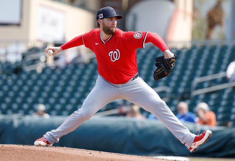 Feb 25, 2025; Jupiter, Florida, USA;  Washington Nationals starting pitcher Trevor Williams (32) throws against the Miami Marlins during the first inning at Roger Dean Chevrolet Stadium. Mandatory Credit: Rhona Wise-Imagn Image 