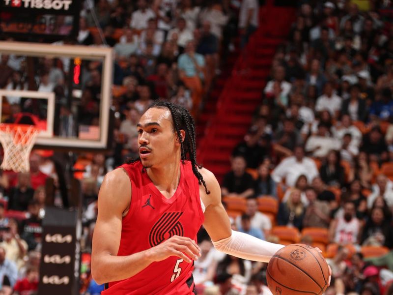 MIAMI, FL - MARCH 29: Dalano Banton #5 of the Portland Trail Blazers dribbles the ball during the game against the Miami Heat on March 29, 2024 at Kaseya Center in Miami, Florida. NOTE TO USER: User expressly acknowledges and agrees that, by downloading and or using this Photograph, user is consenting to the terms and conditions of the Getty Images License Agreement. Mandatory Copyright Notice: Copyright 2024 NBAE (Photo by Issac Baldizon/NBAE via Getty Images)