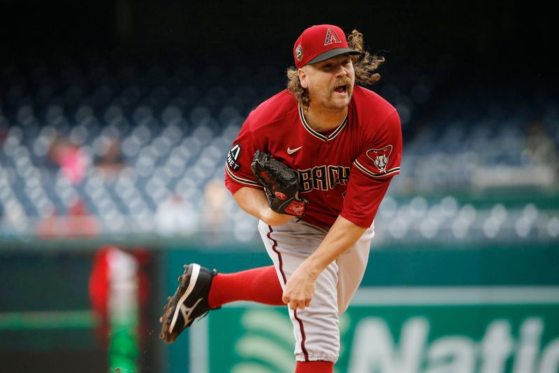 Jun 22, 2023; Washington, District of Columbia, USA; Arizona Diamondbacks relief pitcher Andrew Chafin (57) throws the ball during the eight inning against the Washington Nationals at Nationals Park. Mandatory Credit: Amber Searls-USA TODAY Sports