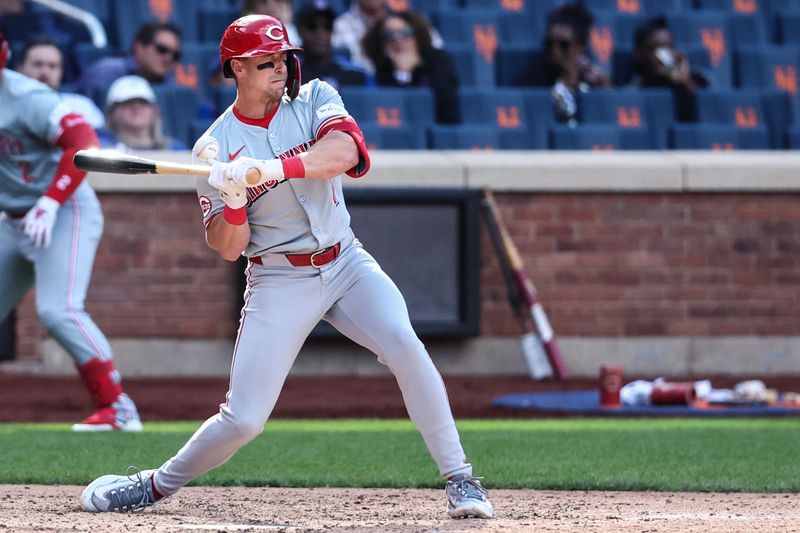 Sep 8, 2024; New York City, New York, USA;  Cincinnati Reds left fielder Spencer Steer (7) reacts after getting hit by the pitch in the ninth inning against the New York Mets at Citi Field. Mandatory Credit: Wendell Cruz-Imagn Images