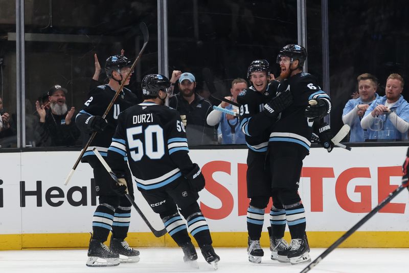 Feb 25, 2025; Salt Lake City, Utah, USA; Utah Hockey Club left wing Lawson Crouse (67) celebrates a go-ahead goal against the Chicago Blackhawks during the second period at Delta Center. Mandatory Credit: Rob Gray-Imagn Images