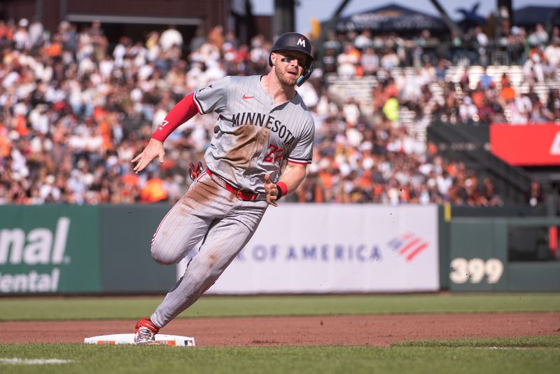 Jul 13, 2024; San Francisco, California, USA; Minnesota Twins catcher Ryan Jeffers (27) rounds third base on his way to score during the fourth inning against the San Francisco Giants at Oracle Park. Mandatory Credit: Ed Szczepanski-USA TODAY Sports