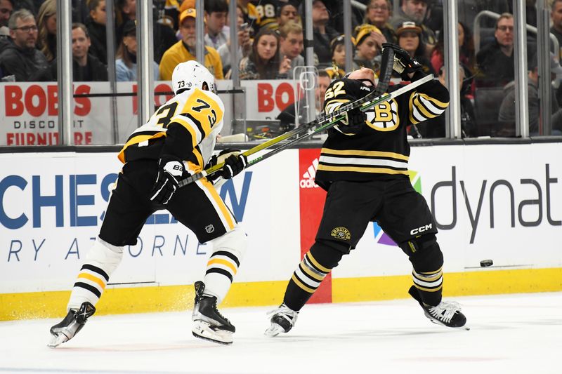 Jan 4, 2024; Boston, Massachusetts, USA; Pittsburgh Penguins defenseman Pierre-Olivier Joseph (73) high sticks Boston Bruins center Oskar Steen (62) during the first period at TD Garden. Mandatory Credit: Bob DeChiara-USA TODAY Sports