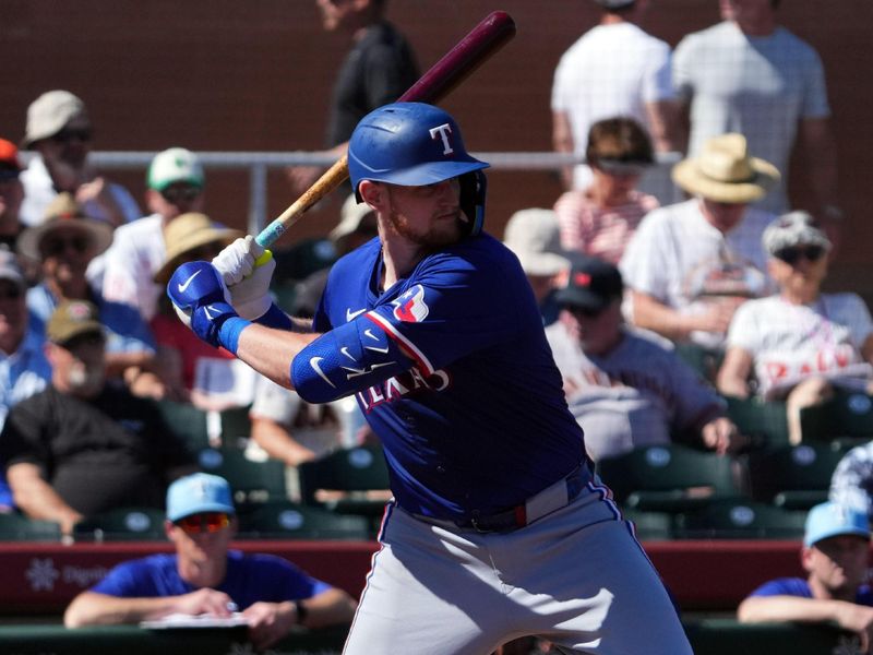 Mar 1, 2024; Scottsdale, Arizona, USA; Texas Rangers catcher Sam Huff (55) bats against the San Francisco Giants during the second inning at Scottsdale Stadium. Mandatory Credit: Joe Camporeale-USA TODAY Sports