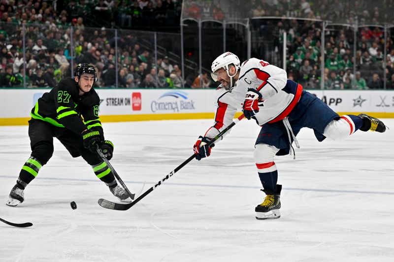 Jan 27, 2024; Dallas, Texas, USA; Washington Capitals left wing Alex Ovechkin (8) shoots the puck past Dallas Stars left wing Mason Marchment (27) during the third period at the American Airlines Center. Mandatory Credit: Jerome Miron-USA TODAY Sports