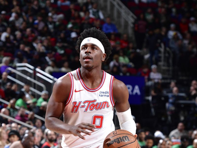 HOUSTON, TX - JANUARY 21: Aaron Holiday #0 of the Houston Rockets handles the ball during the game against the Boston Celtics on January 21, 2024 at the Toyota Center in Houston, Texas. NOTE TO USER: User expressly acknowledges and agrees that, by downloading and or using this photograph, User is consenting to the terms and conditions of the Getty Images License Agreement. Mandatory Copyright Notice: Copyright 2024 NBAE (Photo by Logan Riely/NBAE via Getty Images)