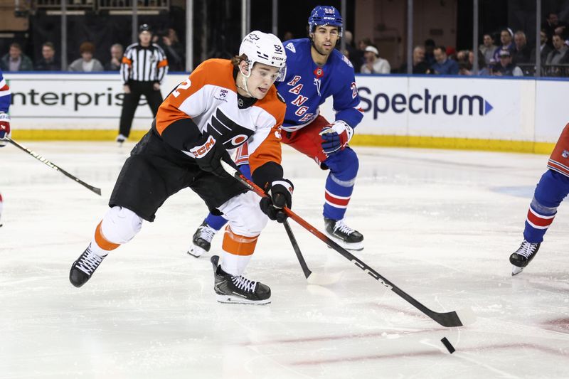 Feb 26, 2026; New York, New York, USA;  Philadelphia Flyers center Denver Barkey (52) controls the puck in the second period against the New York Rangers at Madison Square Garden. Mandatory Credit: Wendell Cruz-Imagn Images