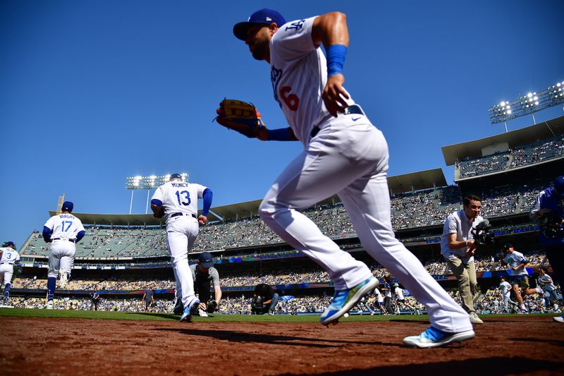 Jun 4, 2023; Los Angeles, California, USA; Los Angeles Dodgers and left fielder David Peralta (6) take the field before the first inning against the New York Yankees at Dodger Stadium. Mandatory Credit: Gary A. Vasquez-USA TODAY Sports