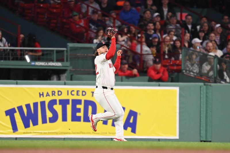 May 30, 2024; Boston, Massachusetts, USA; Boston Red Sox right fielder Wilyer Abreu (52) makes a catch against the Detroit Tigers during the sixth inning at Fenway Park. Mandatory Credit: Eric Canha-USA TODAY Sports