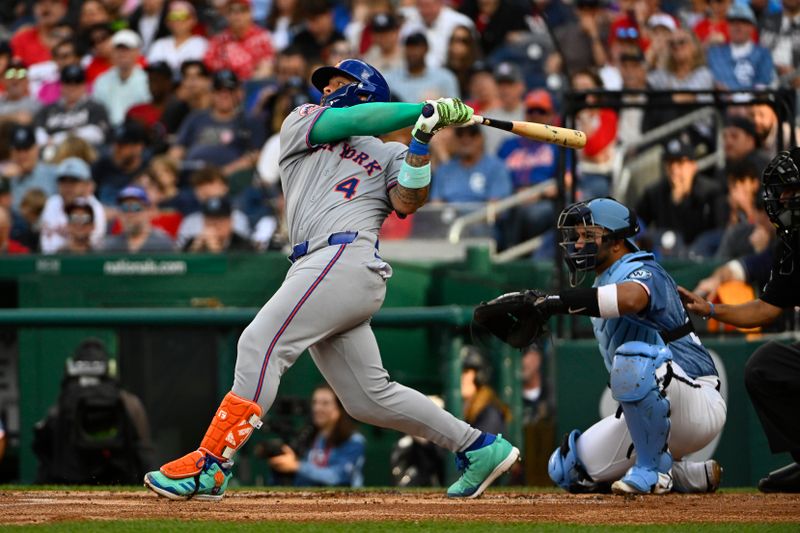 Apr 26, 2025; Washington, District of Columbia, USA; New York Mets catcher Francisco Alvarez (4) hits a two run home run against the Washington Nationals during the second inning at Nationals Park. Mandatory Credit: Brad Mills-Imagn Images