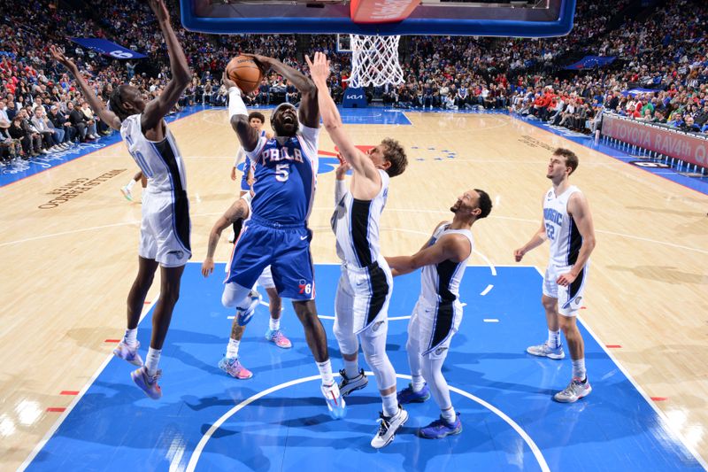 PHILADELPHIA, PA - FEBRUARY 1: Montrezl Harrell #5 of the Philadelphia 76ers drives to the basket during the game against the Orlando Magic on February 1, 2023 at the Wells Fargo Center in Philadelphia, Pennsylvania NOTE TO USER: User expressly acknowledges and agrees that, by downloading and/or using this Photograph, user is consenting to the terms and conditions of the Getty Images License Agreement. Mandatory Copyright Notice: Copyright 2023 NBAE (Photo by Jesse D. Garrabrant/NBAE via Getty Images)