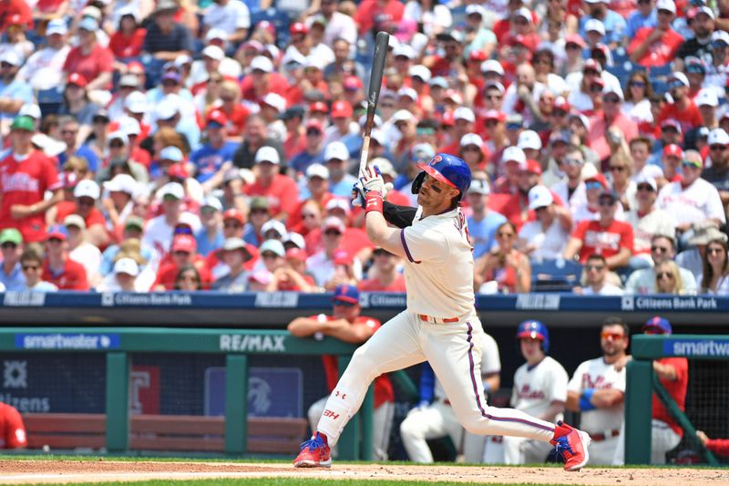 Jun 11, 2023; Philadelphia, Pennsylvania, USA; Philadelphia Phillies designated hitter Bryce Harper (3) hits an RBI single during the first inning against the Los Angeles Dodgers at Citizens Bank Park. Mandatory Credit: Eric Hartline-USA TODAY Sports