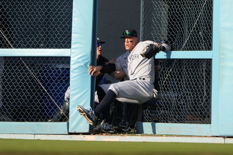 Jun 3, 2023; Los Angeles, California, USA; New York Yankees right fielder Aaron Judge (99) catches a fly ball by Los Angeles Dodgers designated hitter J.D. Martinez (28) in the eighth inning at Dodger Stadium. Mandatory Credit: Kirby Lee-USA TODAY Sports