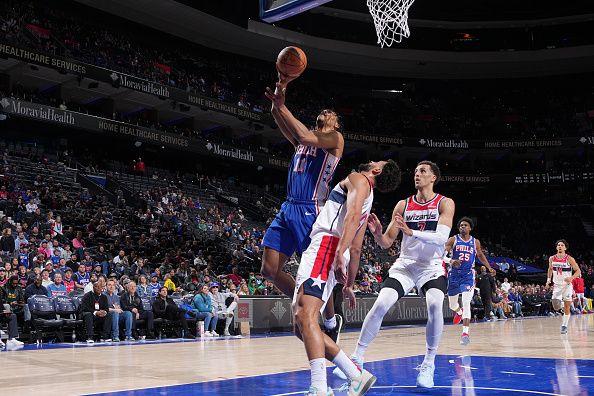 PHILADELPHIA, PA - DECEMBER 11: Jaden Springer #11 of the Philadelphia 76ers drives to the basket during the game against the Washington Wizards on December 11, 2023 at the Wells Fargo Center in Philadelphia, Pennsylvania NOTE TO USER: User expressly acknowledges and agrees that, by downloading and/or using this Photograph, user is consenting to the terms and conditions of the Getty Images License Agreement. Mandatory Copyright Notice: Copyright 2023 NBAE (Photo by Jesse D. Garrabrant/NBAE via Getty Images)