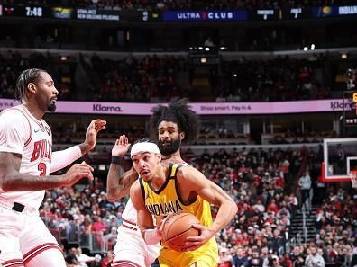 CHICAGO, IL - DECEMBER 28:  Andrew Nembhard #2 of the Indiana Pacers goes to the basket during the game on December 28, 2023 at United Center in Chicago, Illinois. NOTE TO USER: User expressly acknowledges and agrees that, by downloading and or using this photograph, User is consenting to the terms and conditions of the Getty Images License Agreement. Mandatory Copyright Notice: Copyright 2023 NBAE (Photo by Jeff Haynes/NBAE via Getty Images)