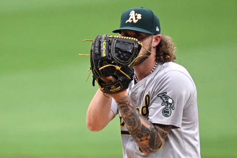 Jun 10, 2024; San Diego, California, USA; Oakland Athletics starting pitcher Joey Estes (68) prepares to pitch against the San Diego Padres during the first inning at Petco Park. Mandatory Credit: Orlando Ramirez-USA TODAY Sports