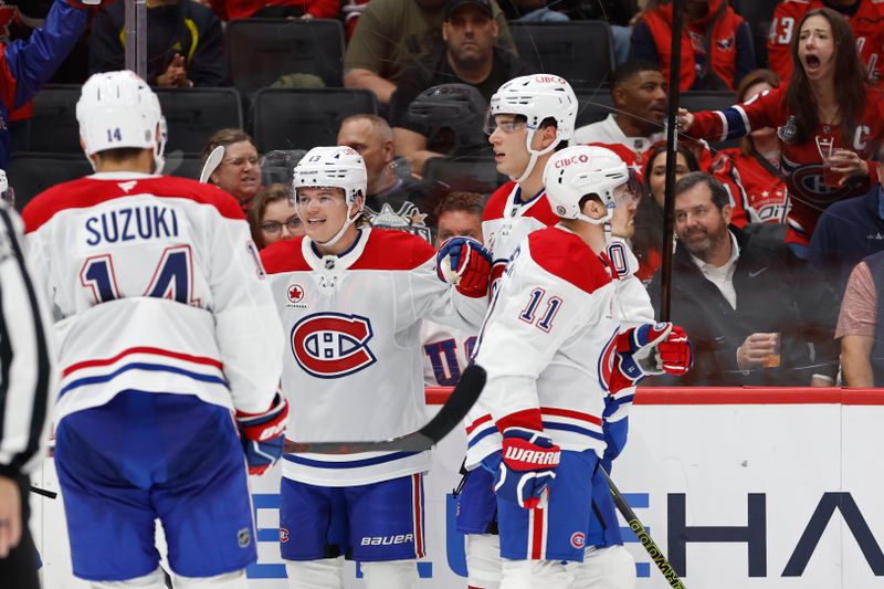 Oct 31, 2024; Washington, District of Columbia, USA; Montreal Canadiens right wing Cole Caufield (13) celebrates with teammates after scoring a goal against the Washington Capitals in the second period at Capital One Arena. Mandatory Credit: Geoff Burke-Imagn Images