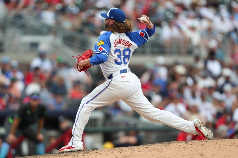 Jun 15, 2024; Cumberland, Georgia, USA; Atlanta Braves relief pitcher Pierce Johnson (38) pitches against the Tampa Bay Rays during the eighth inning at Truist Park. Mandatory Credit: Mady Mertens-USA TODAY Sports