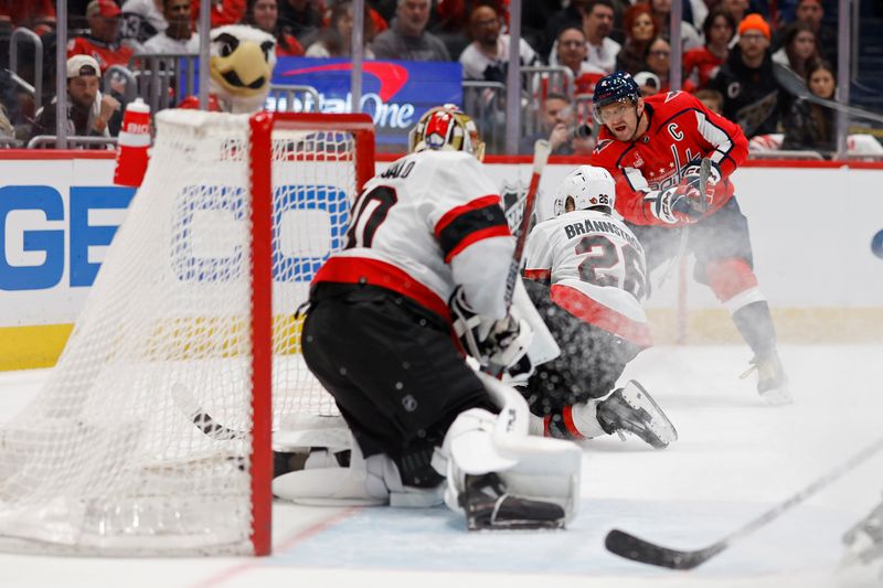 Apr 7, 2024; Washington, District of Columbia, USA; Washington Capitals left wing Alex Ovechkin (8) shoots the puck on Ottawa Senators goaltender Joonas Korpisalo (70) in the third period at Capital One Arena. Mandatory Credit: Geoff Burke-USA TODAY Sports