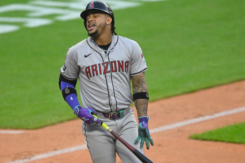 Aug 5, 2024; Cleveland, Ohio, USA; Arizona Diamondbacks designated hitter Ketel Marte (4) reacts after striking out in the sixth inning against the Cleveland Guardians at Progressive Field. Mandatory Credit: David Richard-USA TODAY Sports