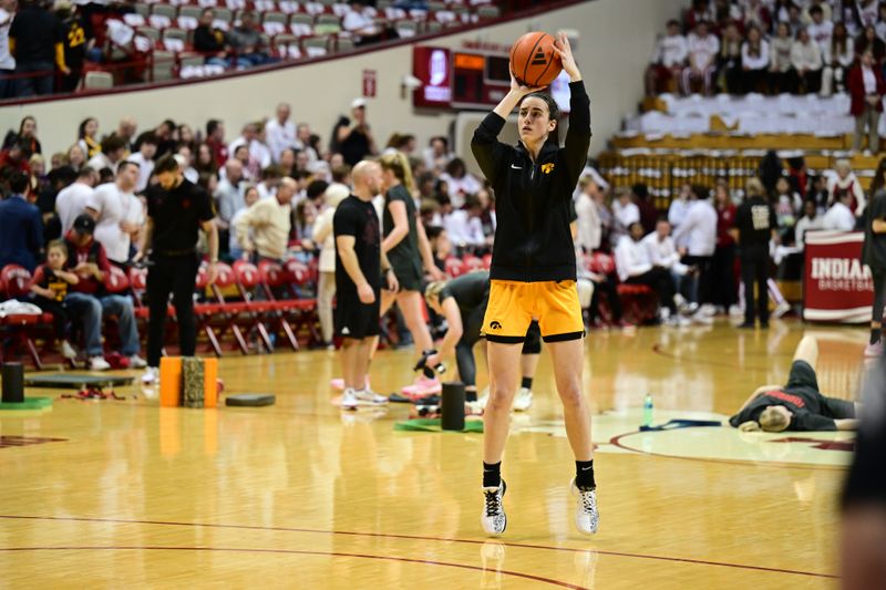 Feb 22, 2024; Bloomington, Indiana, USA; Iowa Hawkeyes guard Caitlin Clark (22) warms up before the game against the Indiana Hoosiers at Simon Skjodt Assembly Hall. Mandatory Credit: Marc Lebryk-USA TODAY Sports