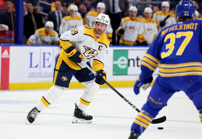 Dec 3, 2023; Buffalo, New York, USA;  Nashville Predators defenseman Roman Josi (59) looks to make a pass during the first period against the Buffalo Sabres at KeyBank Center. Mandatory Credit: Timothy T. Ludwig-USA TODAY Sports