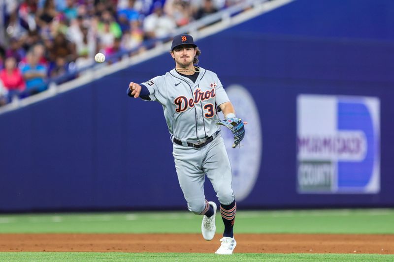 Jul 30, 2023; Miami, Florida, USA; Detroit Tigers right fielder Zach McKinstry (39) throws the baseball to first for the out during the sixth inning at loanDepot Park. Mandatory Credit: Sam Navarro-USA TODAY Sports