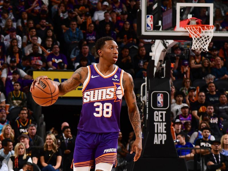 PHOENIX, AZ - MARCH 3:  Saben Lee #38 of the Phoenix Suns handles the ball during the game  on March 3, 2024 at Footprint Center in Phoenix, Arizona. NOTE TO USER: User expressly acknowledges and agrees that, by downloading and or using this photograph, user is consenting to the terms and conditions of the Getty Images License Agreement. Mandatory Copyright Notice: Copyright 2024 NBAE (Photo by Kate Frese/NBAE via Getty Images)