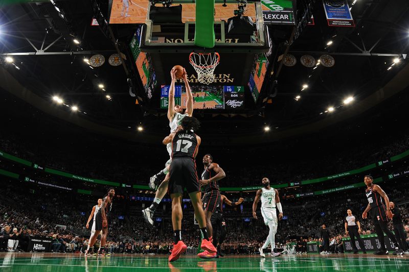 BOSTON, MA - MARCH 18:  Luke Kornet #40 of the Boston Celtics dunks the ball during the game against the Detroit Pistons on March 18, 2024 at the TD Garden in Boston, Massachusetts. NOTE TO USER: User expressly acknowledges and agrees that, by downloading and or using this photograph, User is consenting to the terms and conditions of the Getty Images License Agreement. Mandatory Copyright Notice: Copyright 2024 NBAE  (Photo by Brian Babineau/NBAE via Getty Images)