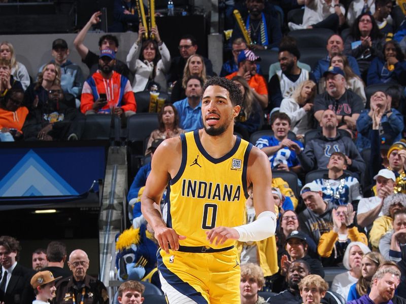 INDIANAPOLIS, IN - NOVEMBER 10:  Tyrese Haliburton #0 of the Indiana Pacers dribbles the ball during the game against the New York Knicks during a regular season game on November 10, 2024 at Gainbridge Fieldhouse in Indianapolis, Indiana. NOTE TO USER: User expressly acknowledges and agrees that, by downloading and or using this Photograph, user is consenting to the terms and conditions of the Getty Images License Agreement. Mandatory Copyright Notice: Copyright 2024 NBAE (Photo by Ron Hoskins/NBAE via Getty Images)