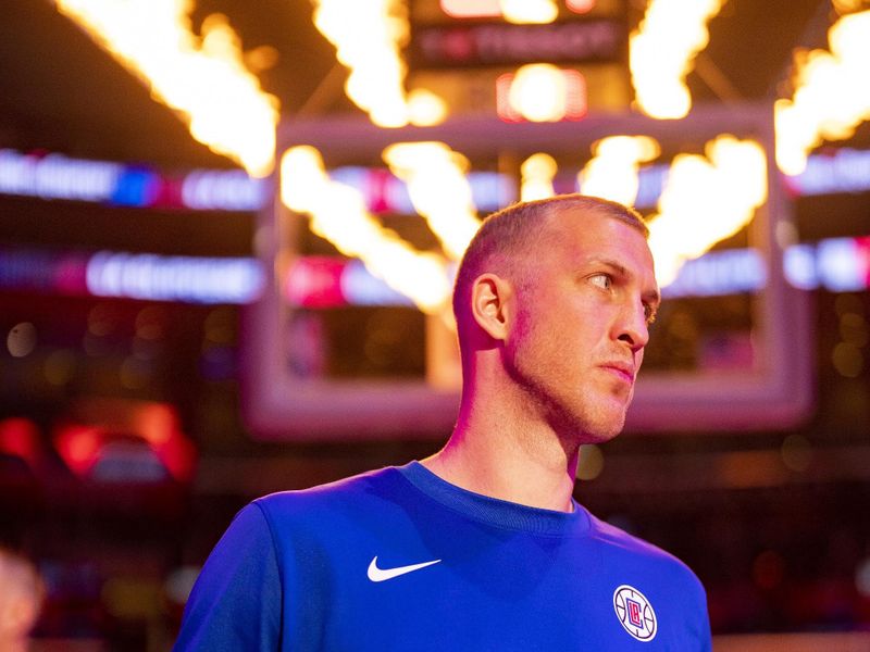 LOS ANGELES, CA - APRIL 12: Mason Plumlee #44 of the LA Clippers looks on before the game against the Utah Jazz on April 12, 2024 at Crypto.Com Arena in Los Angeles, California. NOTE TO USER: User expressly acknowledges and agrees that, by downloading and/or using this Photograph, user is consenting to the terms and conditions of the Getty Images License Agreement. Mandatory Copyright Notice: Copyright 2024 NBAE (Photo by Tyler Ross/NBAE via Getty Images)