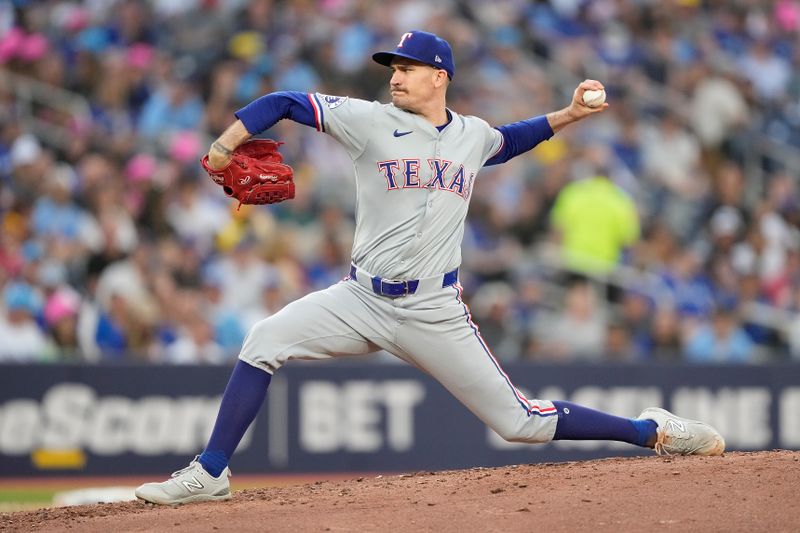 Jul 26, 2024; Toronto, Ontario, CAN; Texas Rangers starting pitcher Andrew Heaney (44) pitches to the Toronto Blue Jays during the third inning at Rogers Centre. Mandatory Credit: John E. Sokolowski-USA TODAY Sports