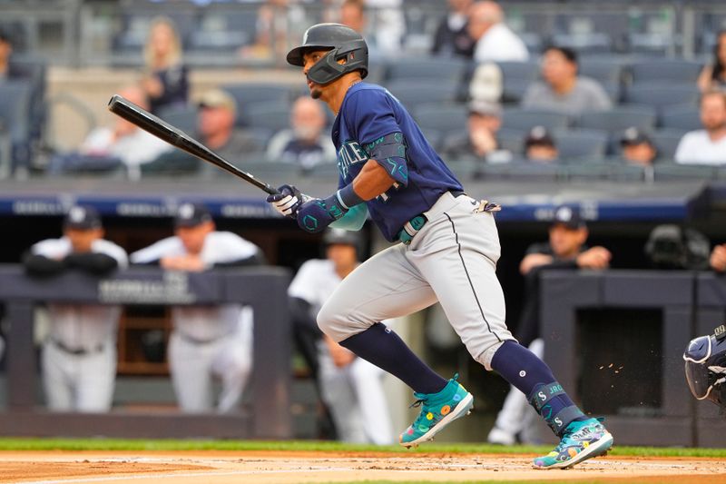 Jun 22, 2023; Bronx, New York, USA; Seattle Mariners center fielder Julio Rodriguez (44) runs out a single against the New York Yankees  during the first inning at Yankee Stadium. Mandatory Credit: Gregory Fisher-USA TODAY Sports