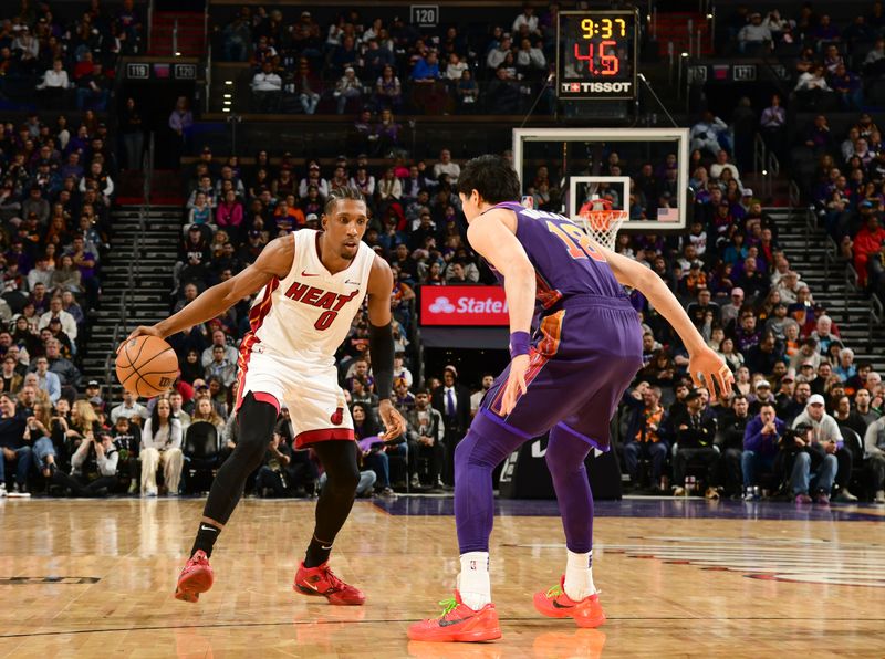 PHOENIX, AZ - JANUARY  5:  Josh Richardson #0 of the Miami Heat handles the ball during the game against the Phoenix Suns on January 5, 2023 at Footprint Center in Phoenix, Arizona. NOTE TO USER: User expressly acknowledges and agrees that, by downloading and or using this photograph, user is consenting to the terms and conditions of the Getty Images License Agreement. Mandatory Copyright Notice: Copyright 2024 NBAE (Photo by Kate Frese/NBAE via Getty Images)