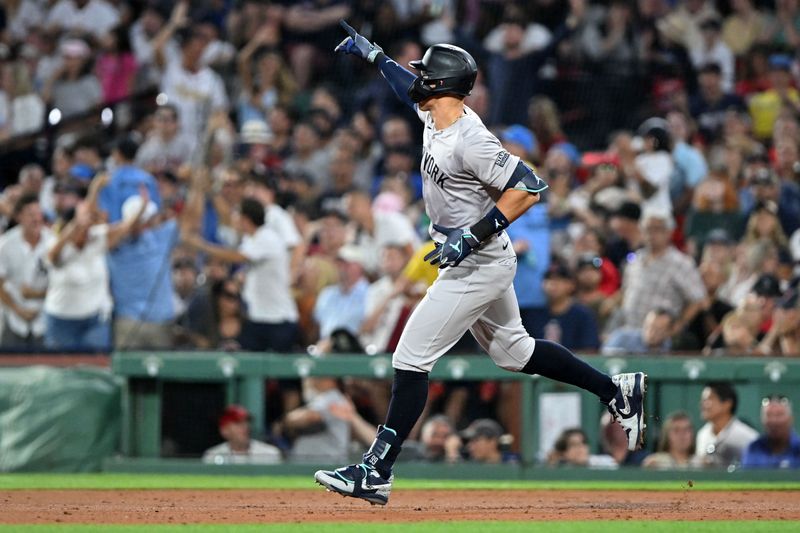 Jul 26, 2024; Boston, Massachusetts, USA; New York Yankees outfielder Aaron Judge (99) runs the bases after hitting a three-run home run against the Boston Red Sox during the seventh inning at Fenway Park. Mandatory Credit: Brian Fluharty-USA TODAY Sports