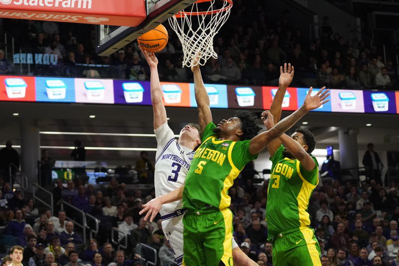 Feb 28, 2026; Evanston, Illinois, USA;v defends Northwestern Wildcats guard Jake West (3) during the second half at Welsh-Ryan Arena. Mandatory Credit: David Banks-Imagn Images