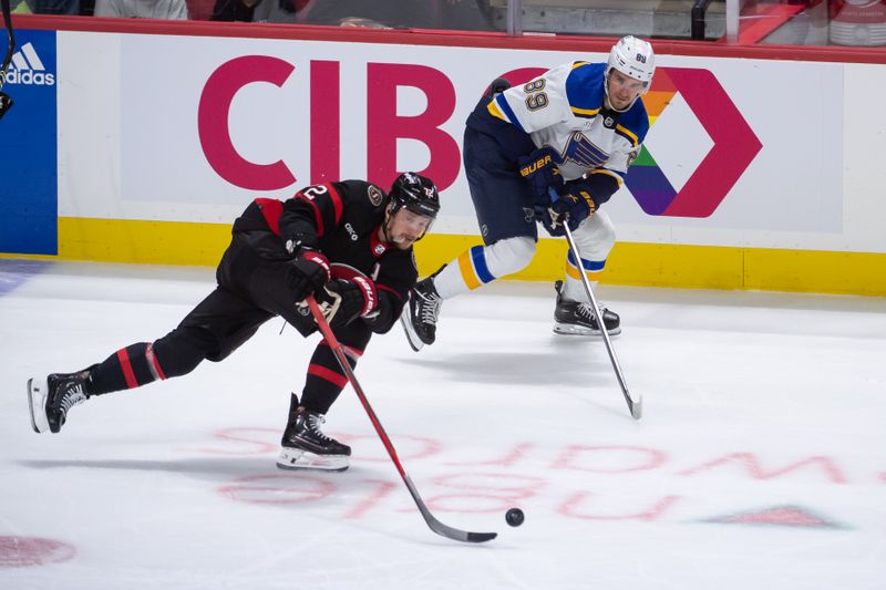 Mar 21, 2024; Ottawa, Ontario, CAN; Ottawa Senators defenseman Thomas Chabot (72) moves the puck away from St. Louis Blues left wing Pavel Buchnevich (89) in the third period at the Canadian Tire Centre. Mandatory Credit: Marc DesRosiers-USA TODAY Sports