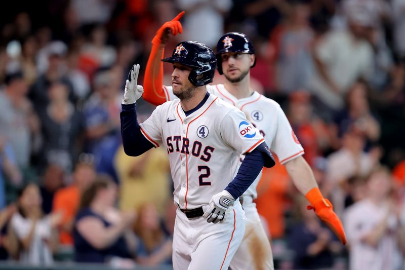 Jun 2, 2024; Houston, Texas, USA; Houston Astros third baseman Alex Bregman (2) celebrates after hitting a two-run home run against the Minnesota Twins during the third inning at Minute Maid Park. Mandatory Credit: Erik Williams-USA TODAY Sports