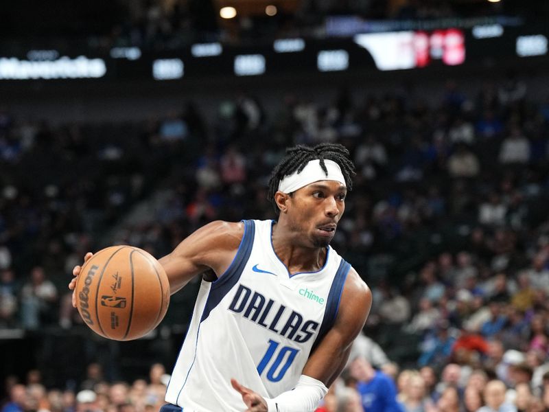 DALLAS, TX - OCTOBER 17: Brandon Williams #10 of the Dallas Mavericks dribbles the ball during the game against the Milwaukee Bucks during a NBA preseason game on October 17, 2024 at American Airlines Center in Dallas, Texas. NOTE TO USER: User expressly acknowledges and agrees that, by downloading and or using this photograph, User is consenting to the terms and conditions of the Getty Images License Agreement. Mandatory Copyright Notice: Copyright 2024 NBAE (Photo by Glenn James/NBAE via Getty Images)