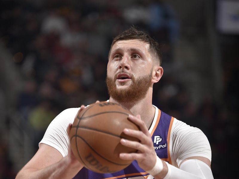 CLEVELAND, OH - MARCH 11:  Jusuf Nurkic #20 of the Phoenix Suns shoots a free throw during the game against the Cleveland Cavaliers on March 11, 2024 at Rocket Mortgage FieldHouse in Cleveland, Ohio. NOTE TO USER: User expressly acknowledges and agrees that, by downloading and/or using this Photograph, user is consenting to the terms and conditions of the Getty Images License Agreement. Mandatory Copyright Notice: Copyright 2024 NBAE (Photo by David Liam Kyle/NBAE via Getty Images)