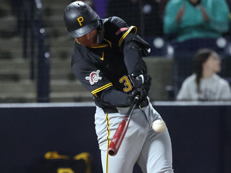 Mar 3, 2025; Tampa, Florida, USA;  Pittsburgh Pirates second base Nick Gonzales (39) doubles against the New York Yankees during the third inning  at George M. Steinbrenner Field. Mandatory Credit: Kim Klement Neitzel-Imagn Images