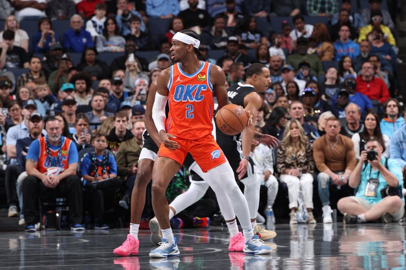 MEMPHIS, TN - MARCH 16: Shai Gilgeous-Alexander #2 of the Oklahoma City Thunder handles the ball during the game against the Memphis Grizzlies on March 16, 2024 at FedExForum in Memphis, Tennessee. NOTE TO USER: User expressly acknowledges and agrees that, by downloading and or using this photograph, User is consenting to the terms and conditions of the Getty Images License Agreement. Mandatory Copyright Notice: Copyright 2024 NBAE (Photo by Joe Murphy/NBAE via Getty Images)