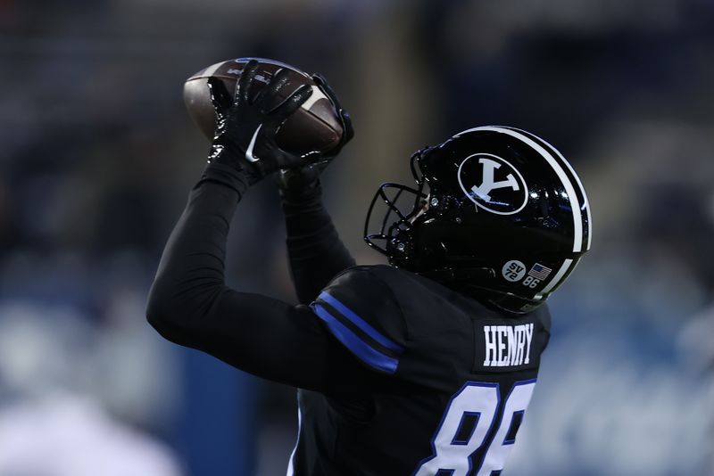 Nov 11, 2023; Provo, Utah, USA; Brigham Young Cougars wide receiver Dom Henry (86) warms up before the game against the Iowa State Cyclones at LaVell Edwards Stadium. Mandatory Credit: Rob Gray-USA TODAY Sports